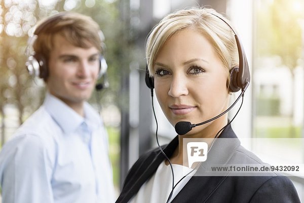 Call centre team wearing headsets