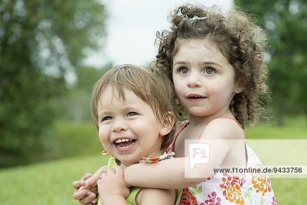Portrait of two toddlers  playing