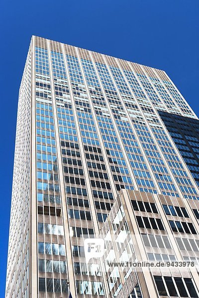 Low angled view of office building in financial district  Manhattan  New York  USA