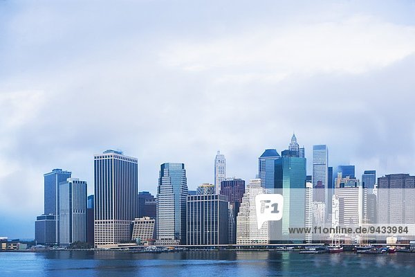 View of East river and Lower Manhattan skyline  New York  USA
