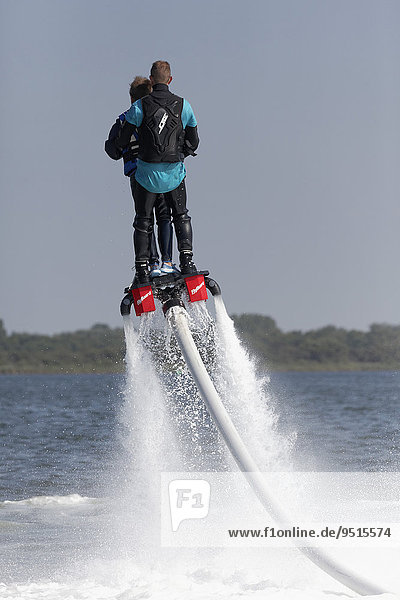 Flyboard show  water jet of a jet ski  Walcheren  Zeeland province  The Netherlands  Europe