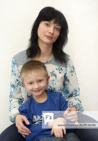 Boy  7 years  with his mother  35 years
