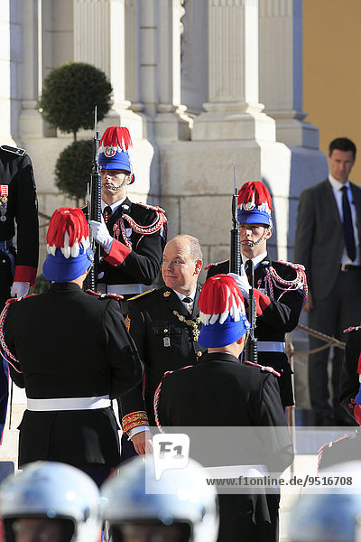 Prince Albert II. of Monaco between the Palace Guards in front of the cathedral on Fête du Prince national holiday  Principality of Monaco