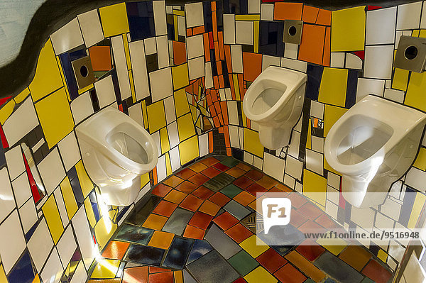 Urinals in the men's room at the Kunsthaus Abensberg by Peter Pelikan  exhibition hall Friedensreich Hundertwasser at the brewery Kuchlbauer  Kuchlbauer's World of Beer  Abensberg  Lower Bavaria  Bavaria  Germany  Europe