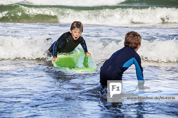 Boys surfing