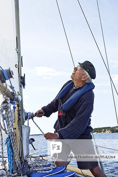 Senior man sailing
