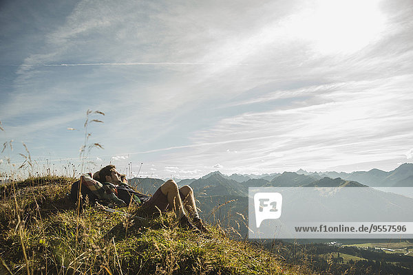 Austria  Tyrol  Tannheimer Tal  young hiker having a rest