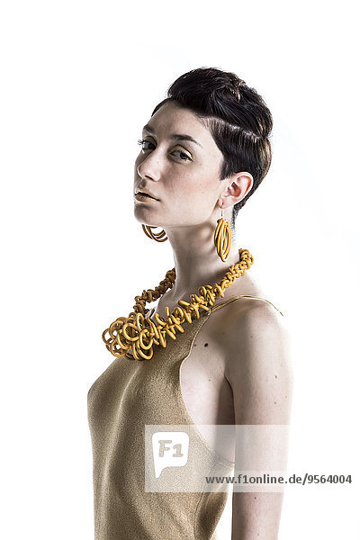 Portrait of Young Woman wearing Modern Jewellery  Studio Shot