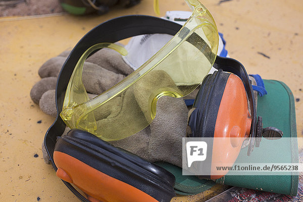 Close-up of construction worker's safety equipment