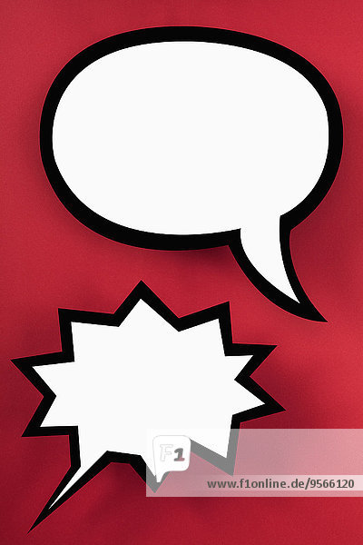 Blank speech bubbles against red background