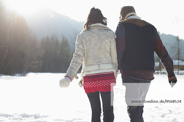 Couple walking in snow