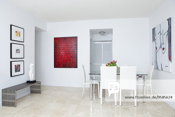 Wall art  table and chairs in modern dining room