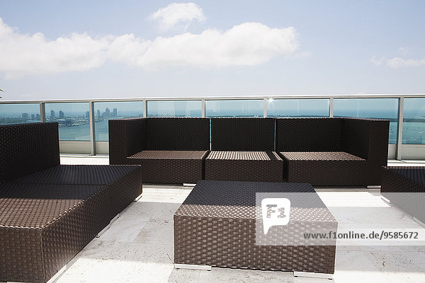 Sofas and coffee table on modern patio