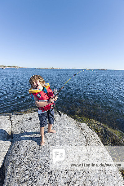 Fröhlichkeit Junge - Person Meer angeln