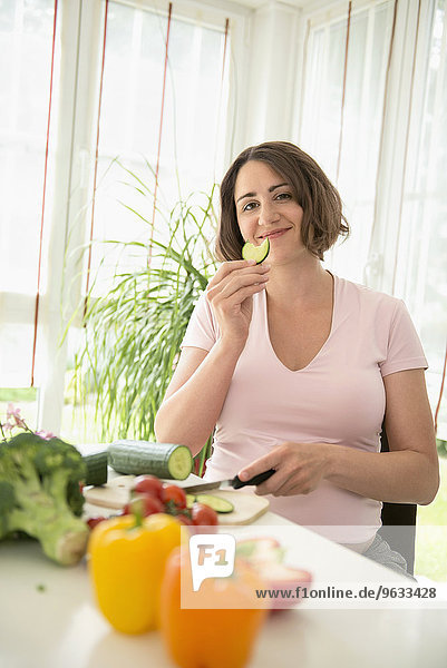 Eating pregnant woman preparing healthy lunch