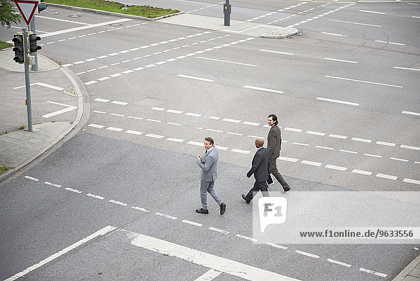 Teamwork businessmen Cooperation crossing road