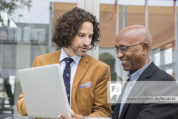 Men two business laptop computer suit meeting