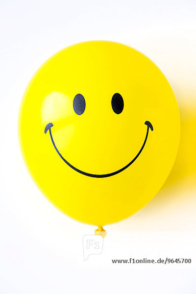 Balloon  yellow  with friendly smiley face