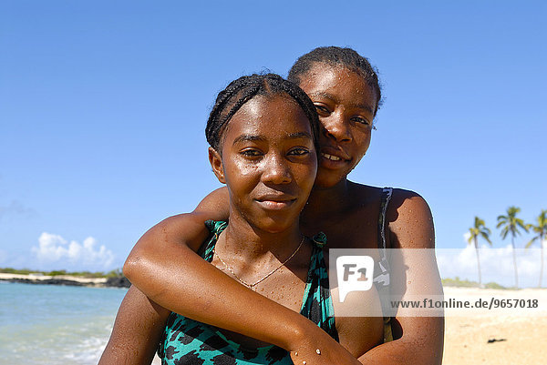 Local girls on the beach of Grand Comore island  also called Ngazidja island  Comoros  Africa