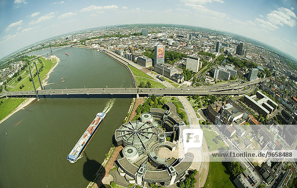 View of Duesseldorf from the Rheinturm Tower  foreground the building of the legislative assembly of North Rhine-Westphalia  Rhine River separates the historic district of Duesseldorf on the right from the Oberkassel quartier on the left  Duesseldorf  North Rhine-Westphalia  Germany  Europe