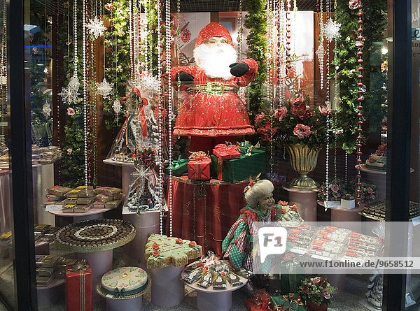 Christmassy decorated confectionery-shop window  Duesseldorf  North Rhine-Westphalia  Germany  Europe