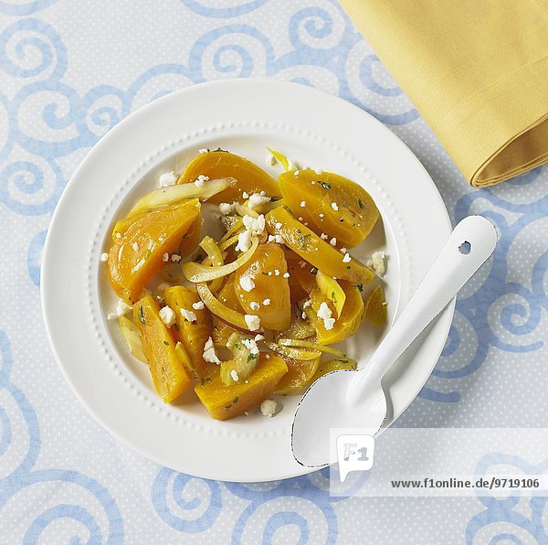 Yellow beets with onions and feta cheese