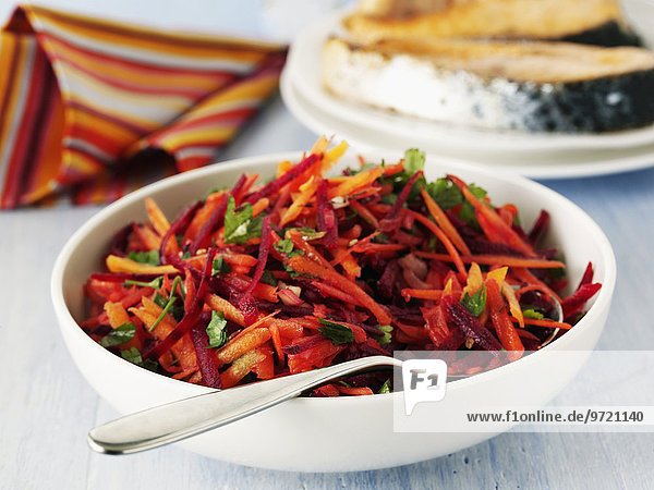 A colourful carrot salad with parsley
