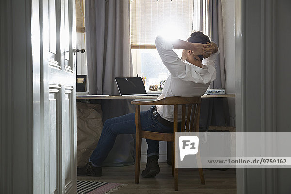 Man having a break at his home office