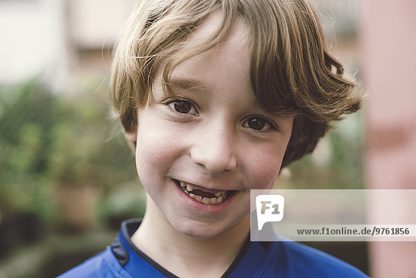 Portrait of smiling boy with tooth gap