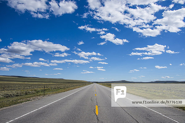 Long straight road in southern Wyoming  United States of America  North America