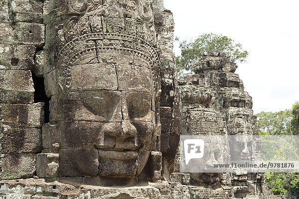 Huge faces carved in stone  Bayon Temple  UNESCO World Heritage Site  Angkor  Siem Reap  Cambodia  Indochina  Southeast Asia  Asia