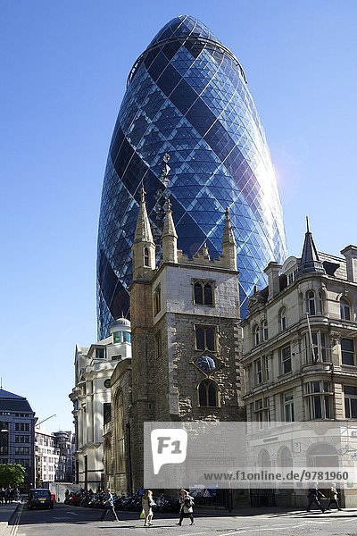 30 St Mary Axe (The Gherkin) with St. Andrew Undershaft church  City of London  England  United Kingdom  Europe