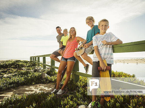 Portrait of family with three children (6-7  10-11  14-15) on vacation
