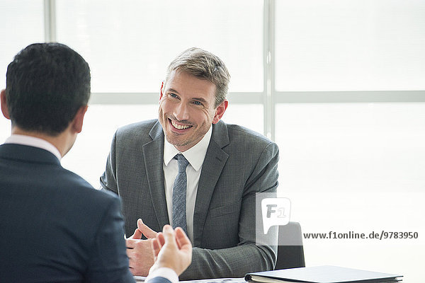 Businessman meeting with associate in office