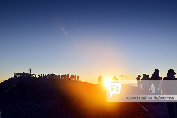 USA  Hawaii  Maui  Haleakala  tourists awaiting sunset on mountain top