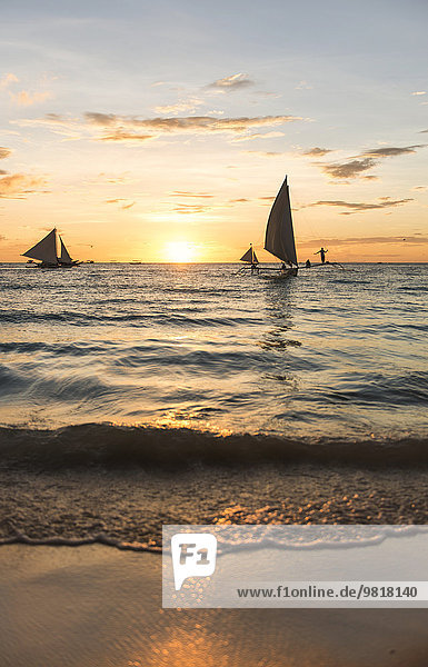 Philippines  Boracay  sunset with sailing boats