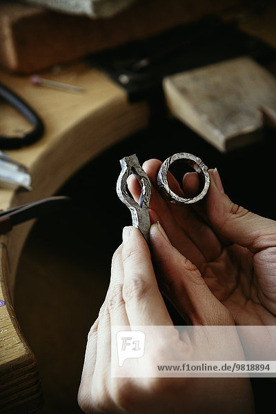 Goldsmith working on wedding rings in Mokume Gane style