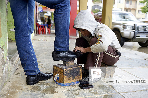 Shoeshine boy  10 years  street child  Cochabamba  Bolivia  South America
