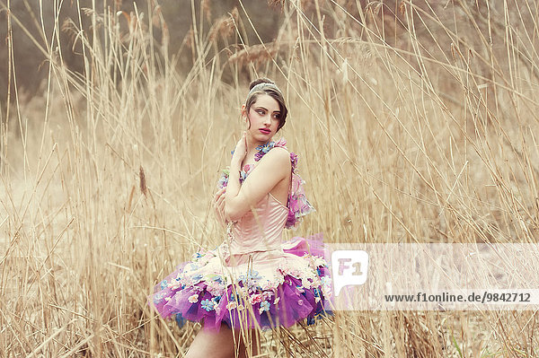 Ballerina wearing a tutu  in the reeds