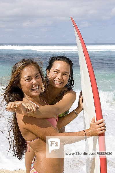 Girls On Beach With Surfboard  Maui  Hawaii