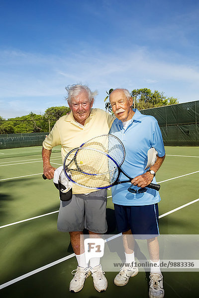 'Senior men after playing tennis  83 year old and 98 year old; Maui  Hawaii  United States of America'