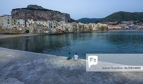 Italy  Sicily  Cefalu  view to bay with medieval houses at evening