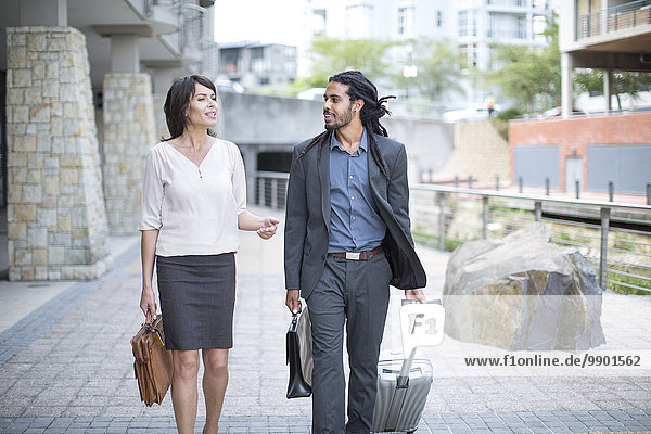 Businessman and woman on business trip