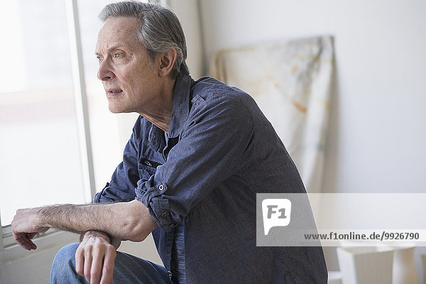 Portrait of senior man indoors
