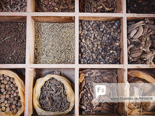 Overhead view of dried spices for sale in market