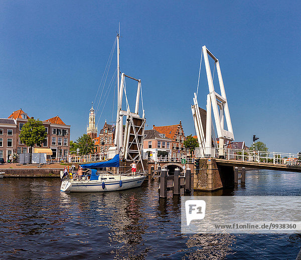Haarlem  Netherlands  Holland  Europe  city  village  water  summer  people  ships  boat  sailing ship  open  bridge  drawbridge  Bakenesser  church
