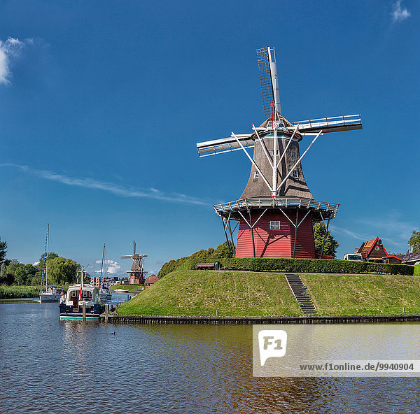 Netherlands  Holland  Europe  Dokkum  Friesland  windmill  village  water  summer  ships  boat  Towermill  Hope