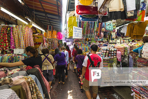 Market road with stalls selling clothes  Bangkok  Thailand  Asia