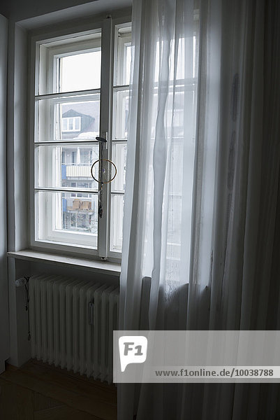 Curtain at window of a house  Bavaria  Germany