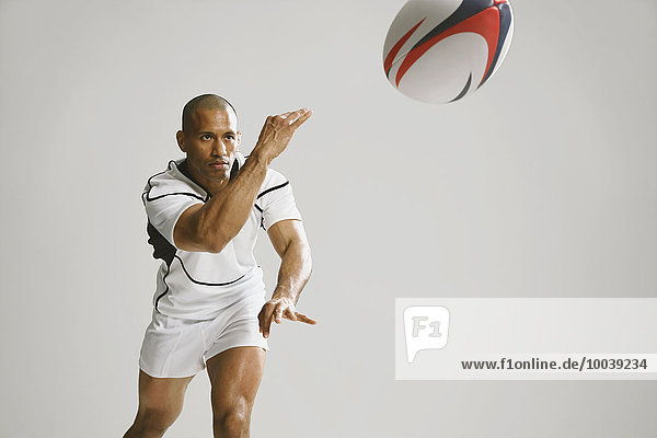 Bald male rugby player